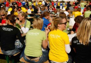 employees gathering for lunch, merily discussing