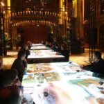 Managers sitting at interactive tables for business training